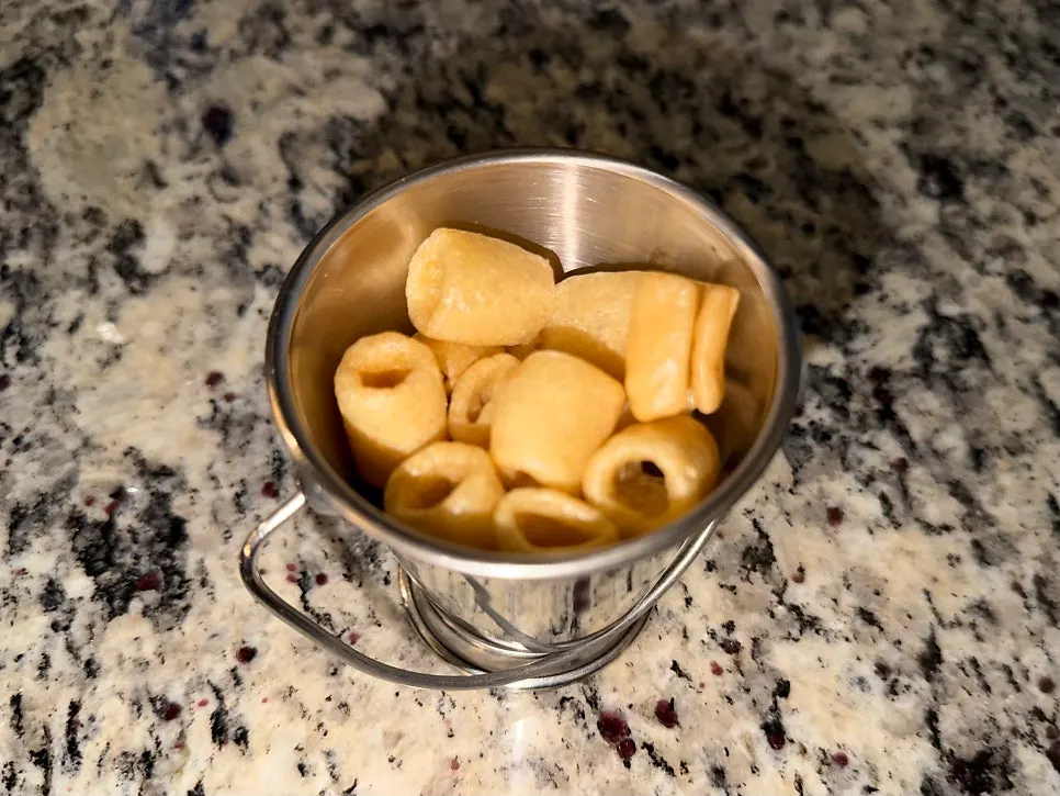Hiku's complimentary macaroni puffed rice crackers