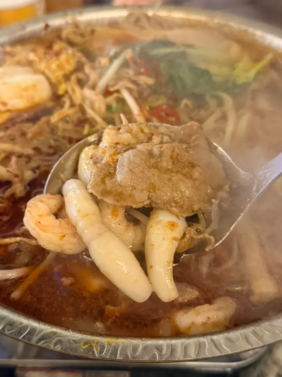 Ingredients scooped up from the mala hot pot