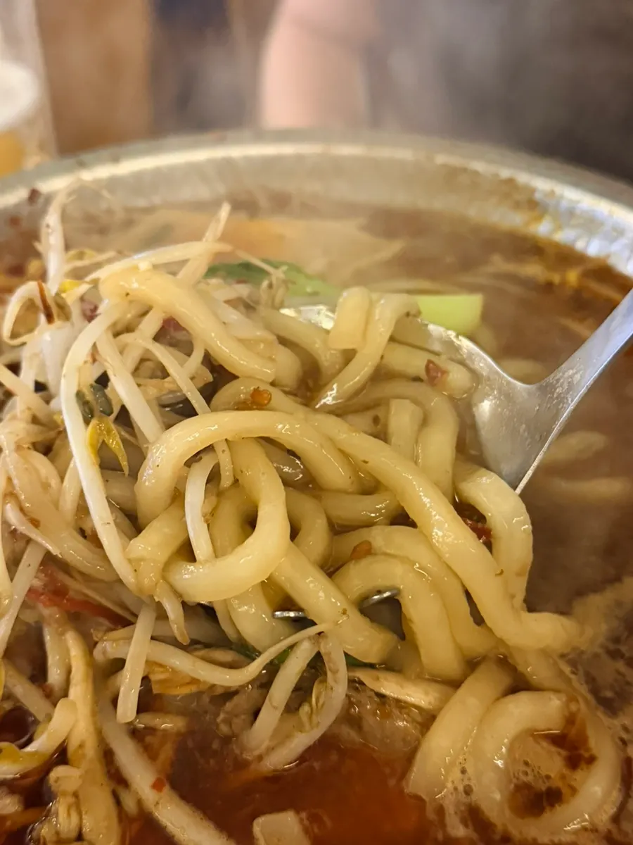Udon noodles included by default in the mala hot pot