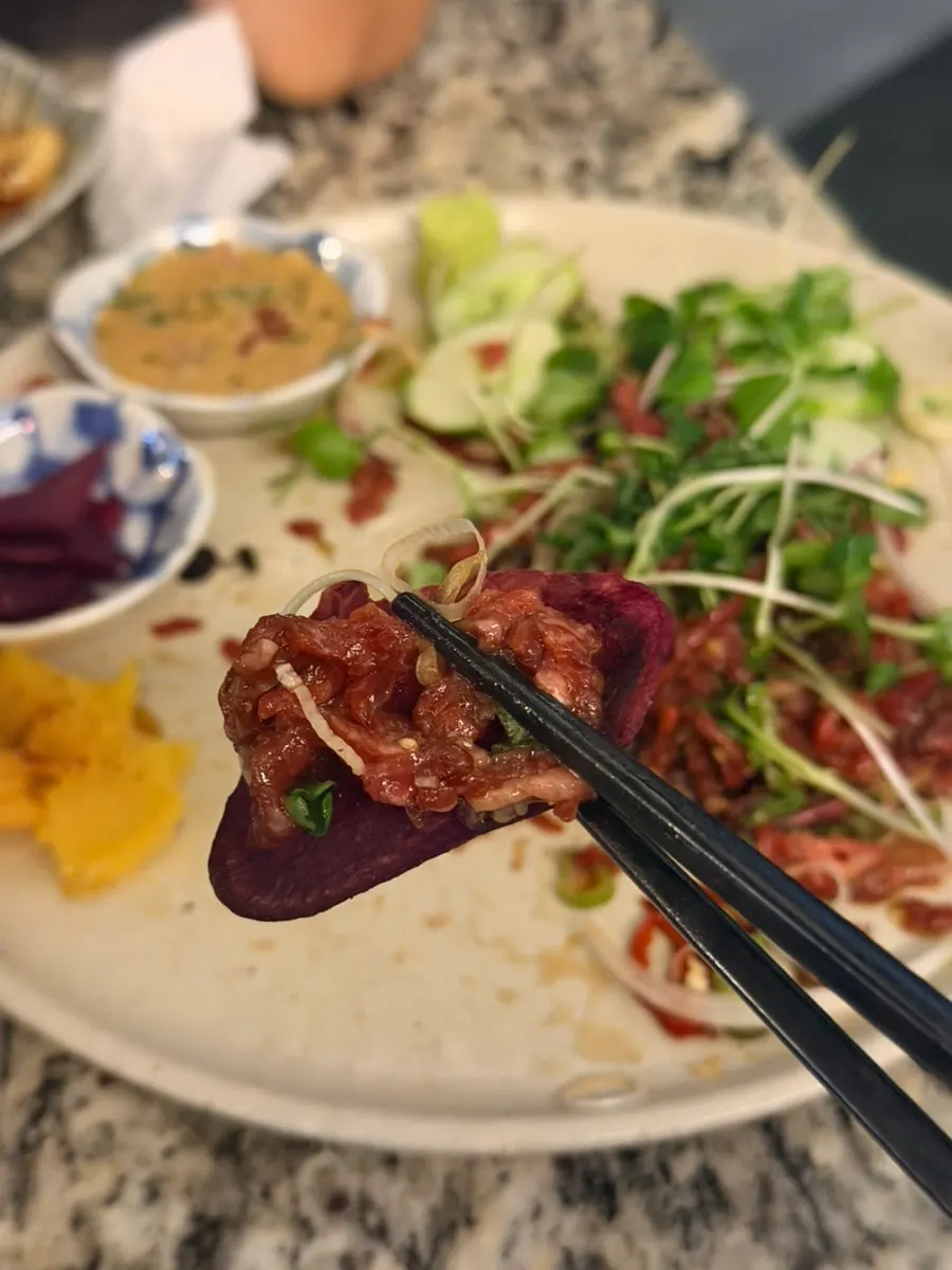 Beef tartare served on a sweet potato chip