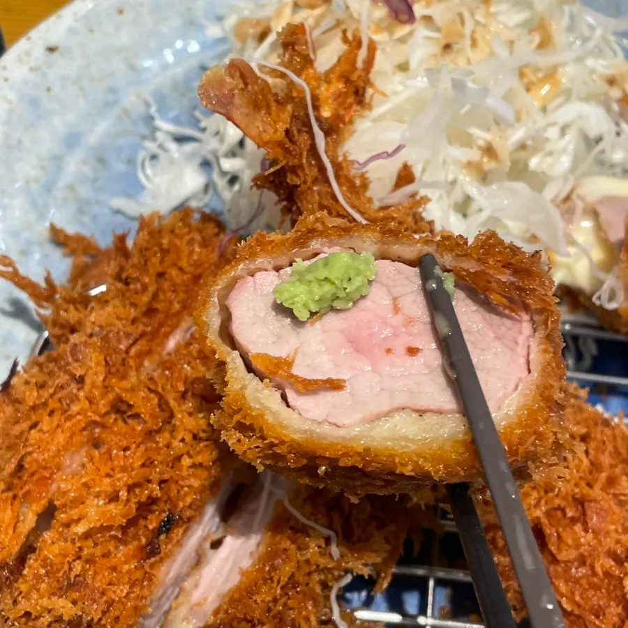 A piece of cheese katsu packed with cheese