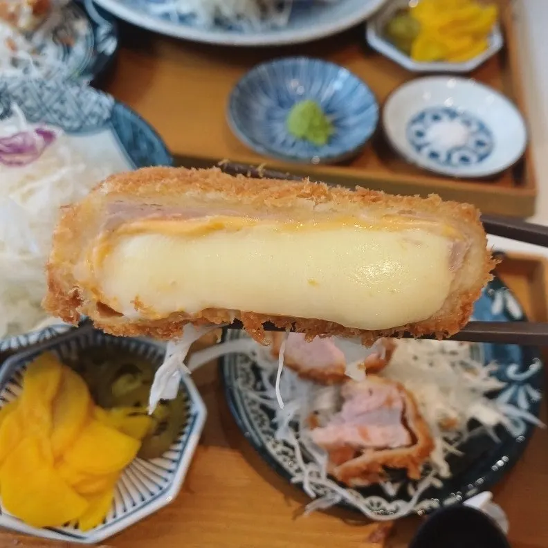 Himawari's cheese katsu filled with melted cheese