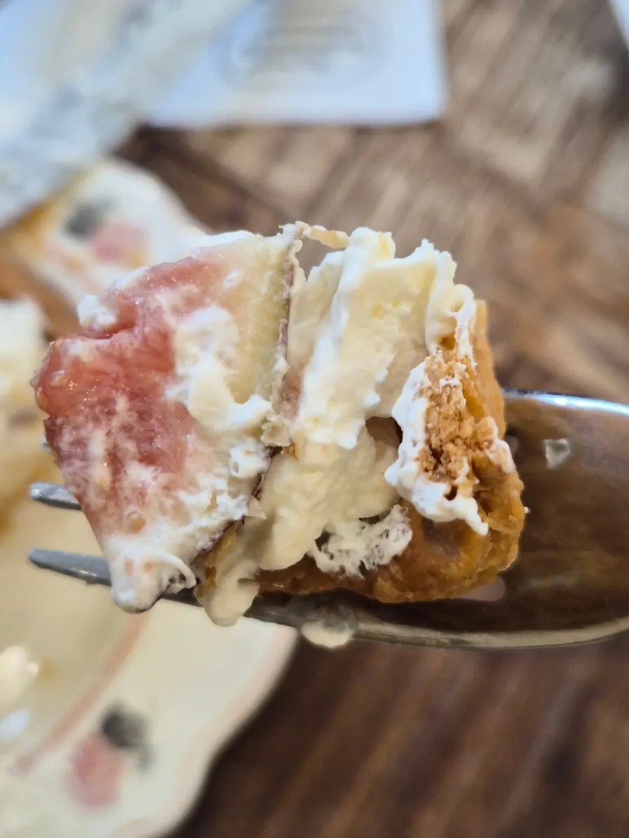 Cross-section of the cream pie topped with fig
