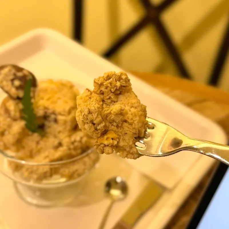 Spoonful of cream pudding and crumble
