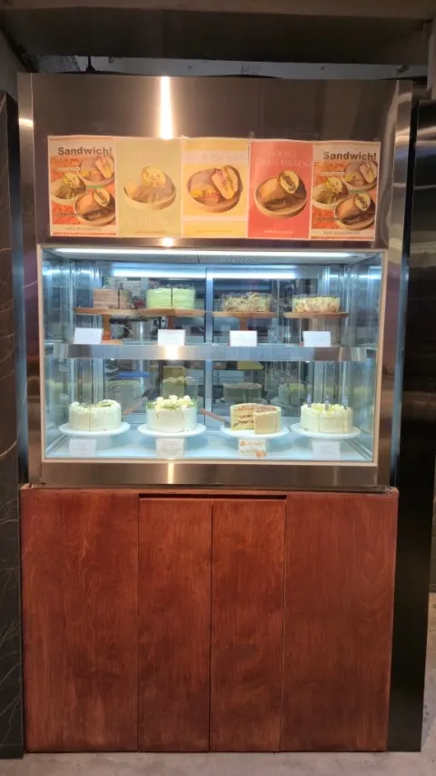 Cake display case at HYBE Playground