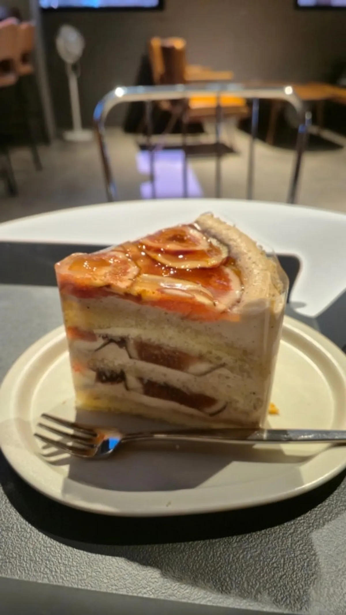 Cross-section of earl grey fig cake topped with fig