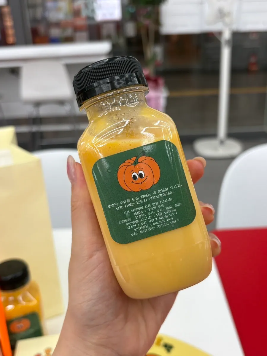Cup of Hohobak milk made with sweet pumpkin
