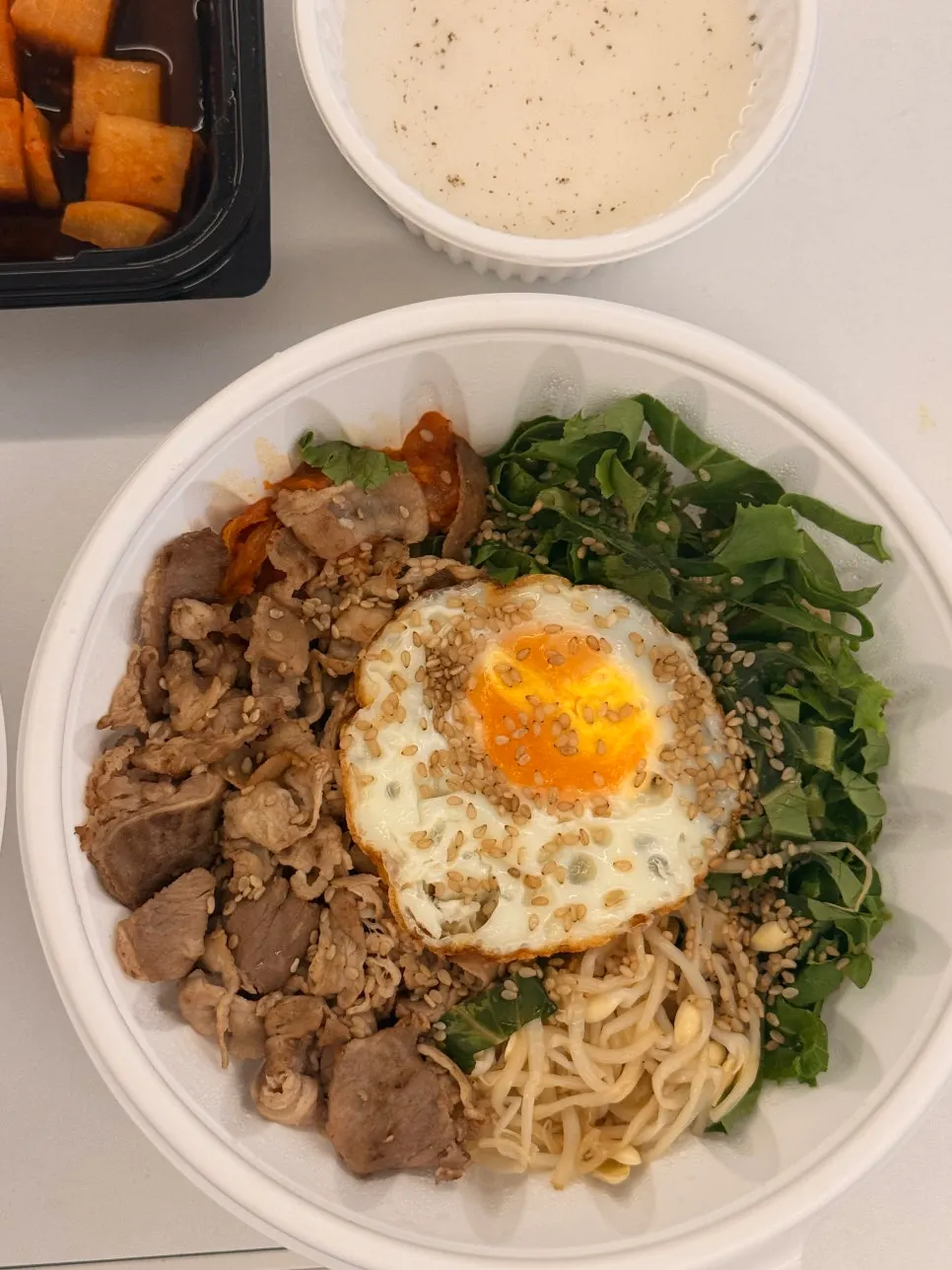 Beef brisket bibimbap topped with brisket