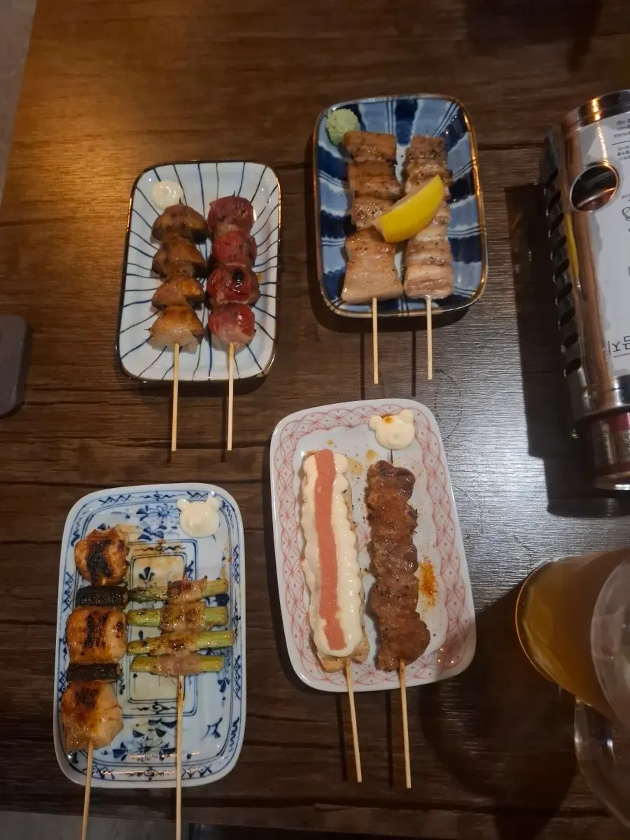 Yakitori skewers served one after another