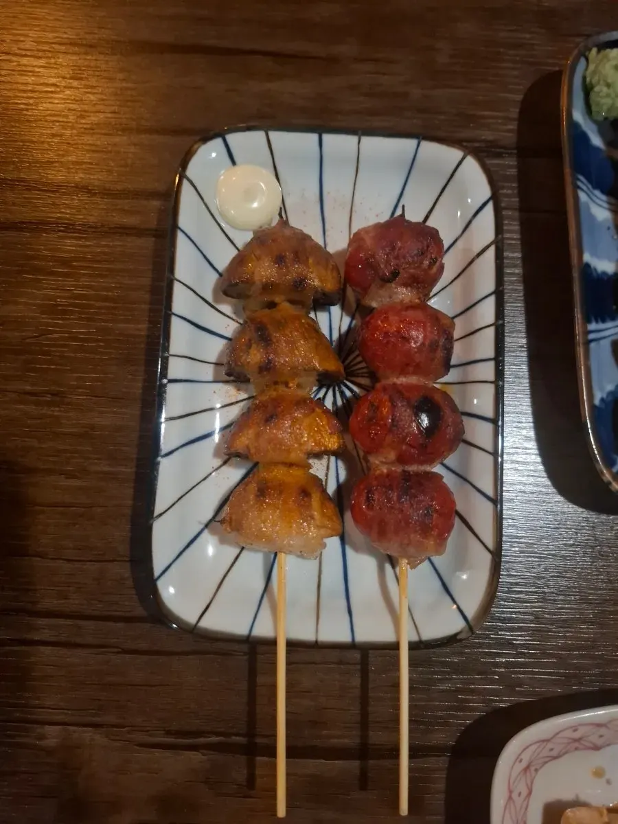 Plate of heart skewers with rising charcoal aroma