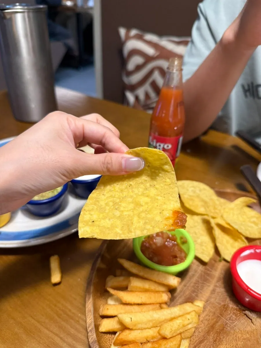 Grilled beef taco and quesadilla meal combination