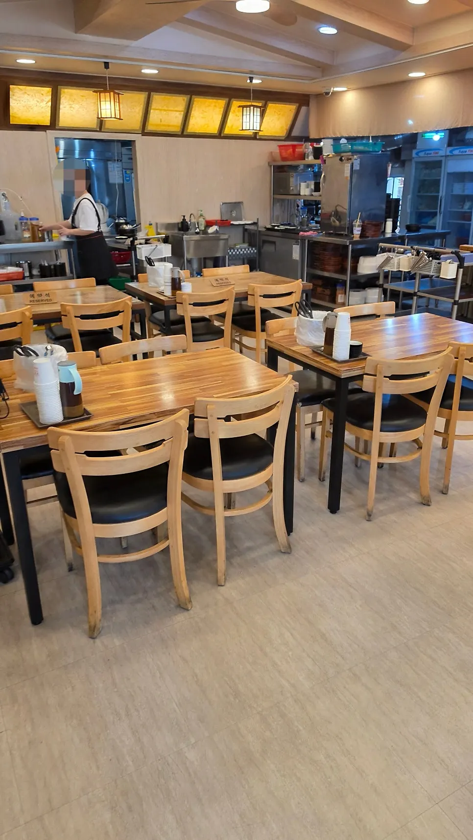 Interior of Hoegi Wang Galbitang with generously spaced tables