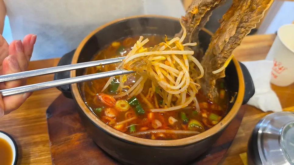 Spicy galbitang loaded with bean sprouts