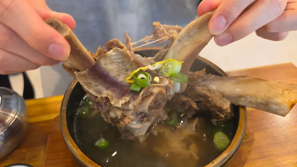 Pulling apart the wang galbi by hand