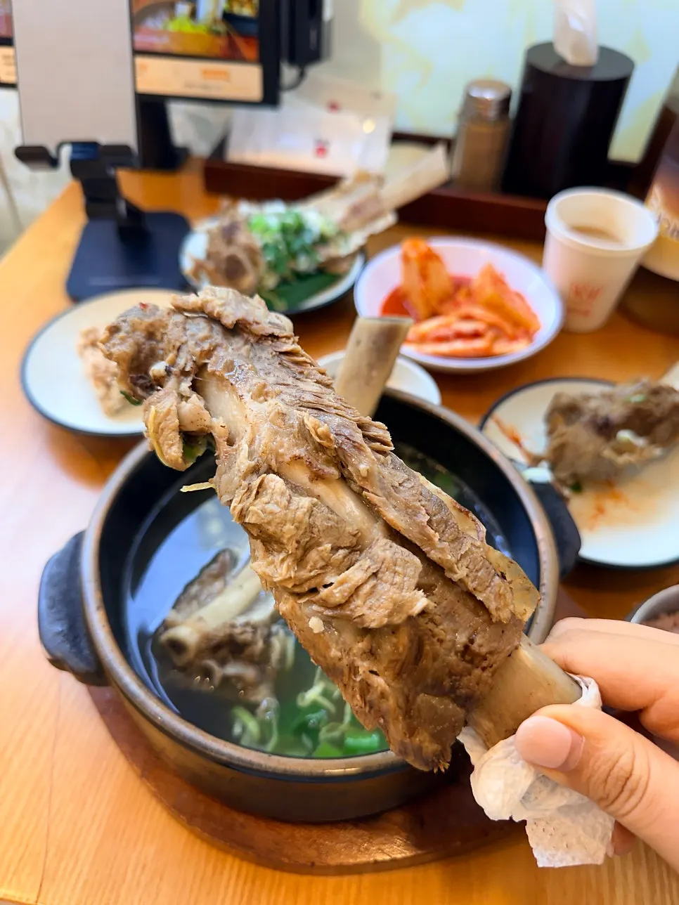 Close-up of the wang galbitang's clean broth