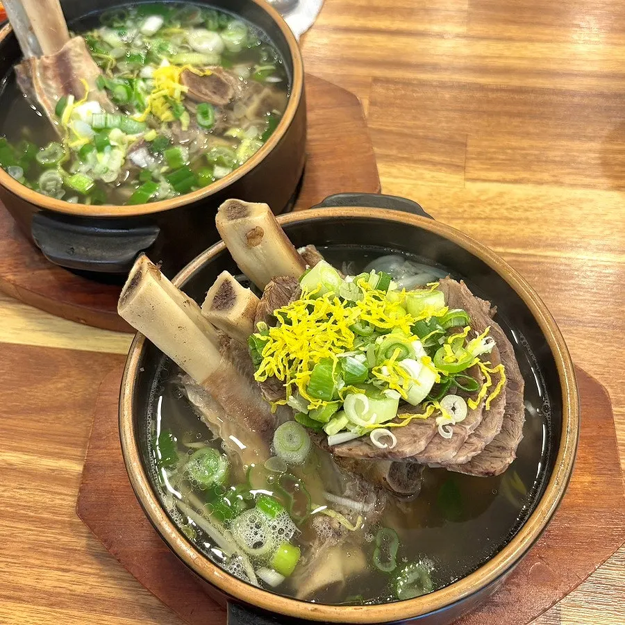 An empty bowl of galbitang after finishing the meal at Hoegi Wang Galbitang