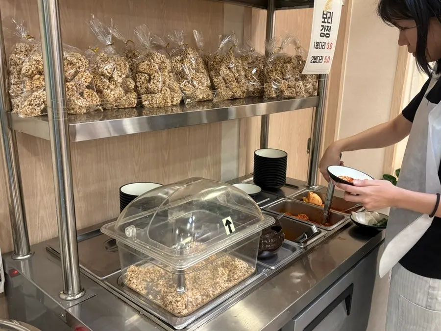 Barley gangjeong snacks set out in the self-serve area