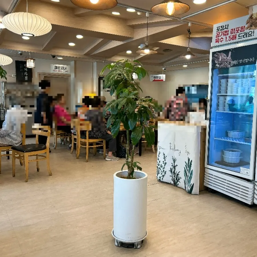 Interior seating of Hoegi Wang Galbitang with many tables