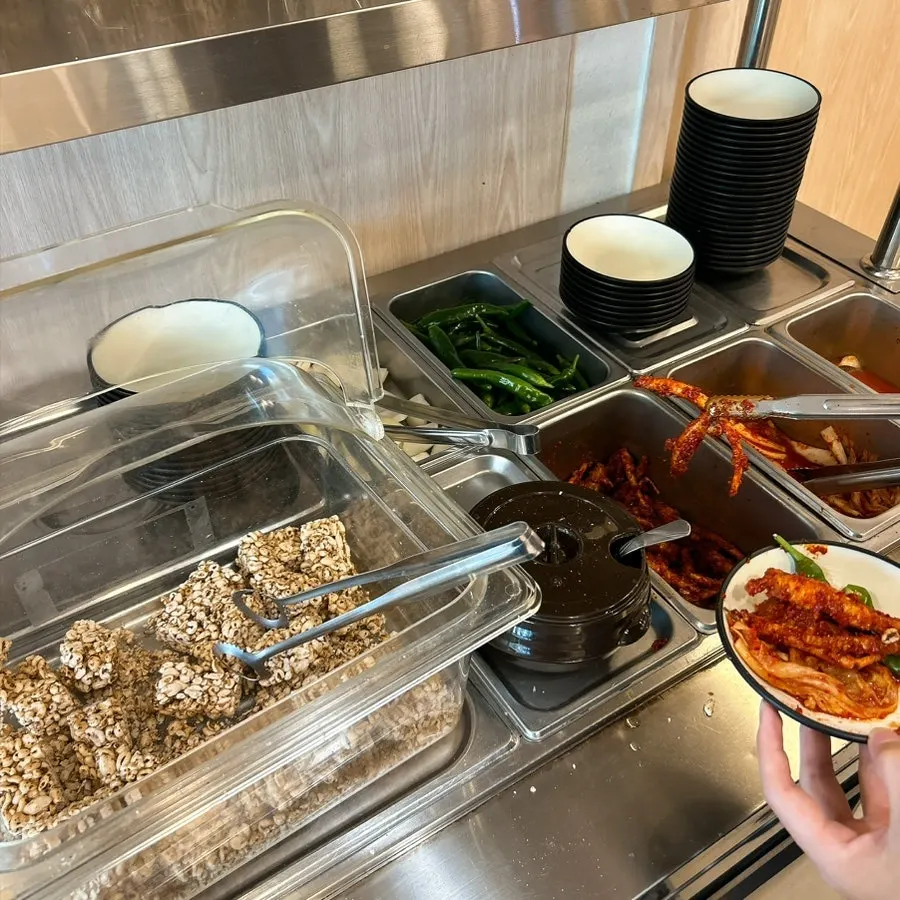 Self-serve bar for refilling rice and basic side dishes
