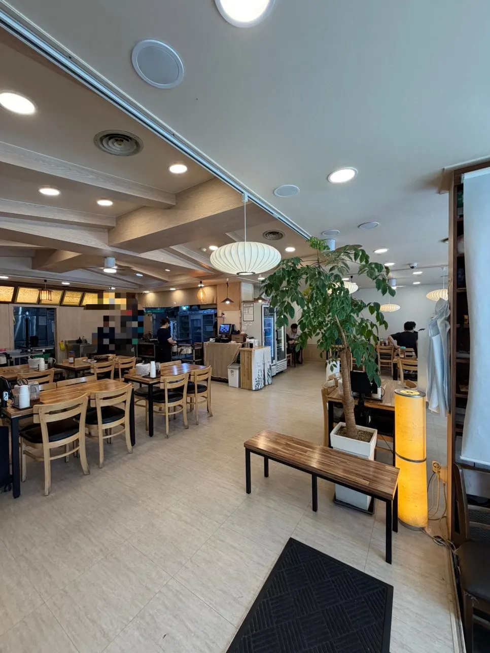 Wood-toned, tidy restaurant interior