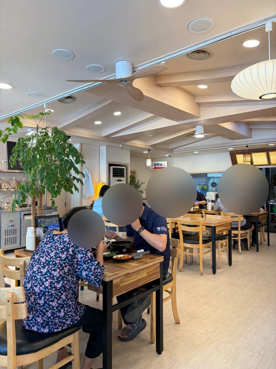 Dining hall seating under soft lighting
