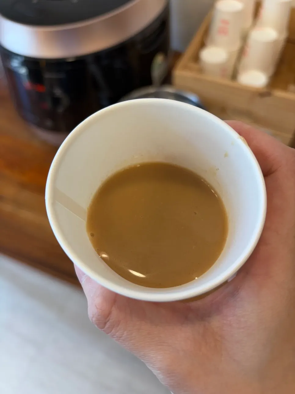 A cup of nutty misutgaru mixed and ready to drink