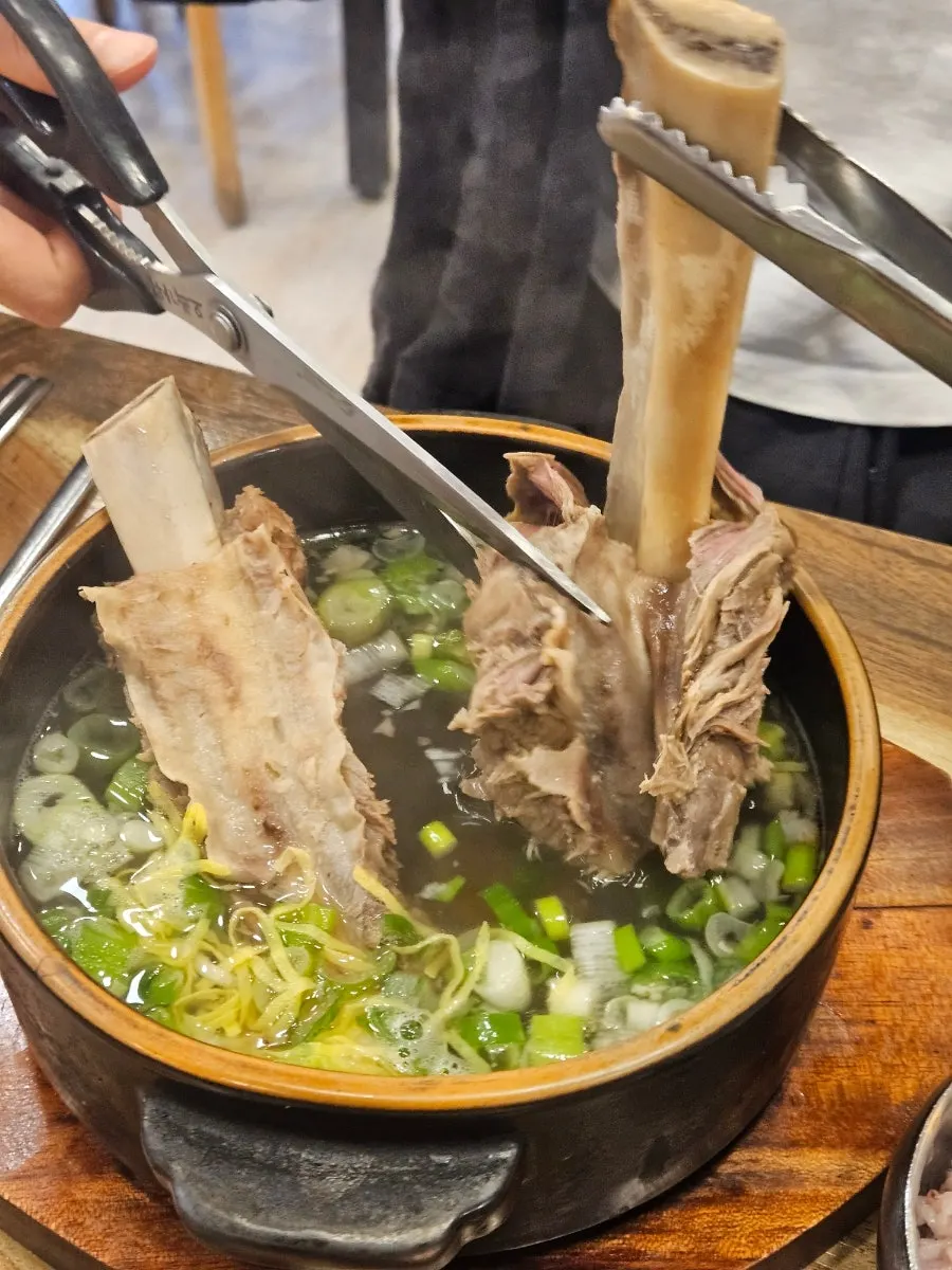 Close-up of clear galbitang with rib bones