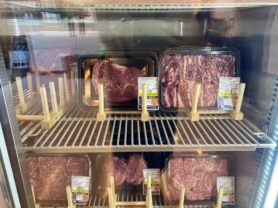 Another fridge section with small-packed hanwoo cuts