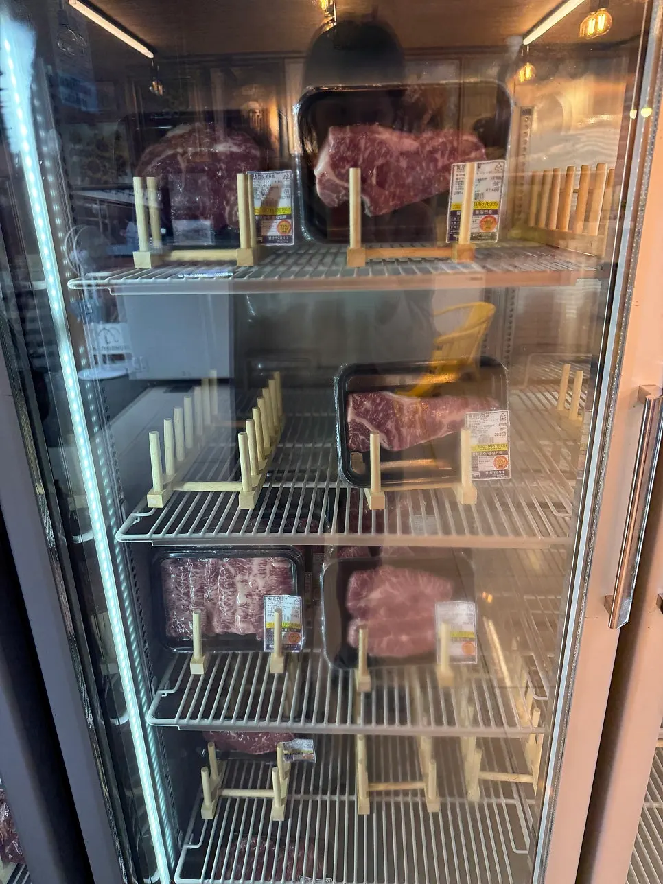 Hoengseong hanwoo cuts arranged by part in the refrigerated case