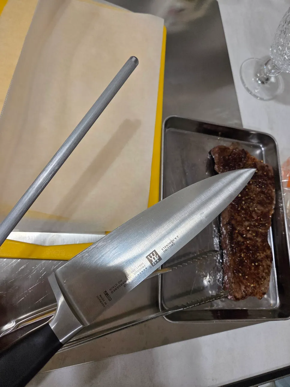 Striploin steak resting after being seared on both sides