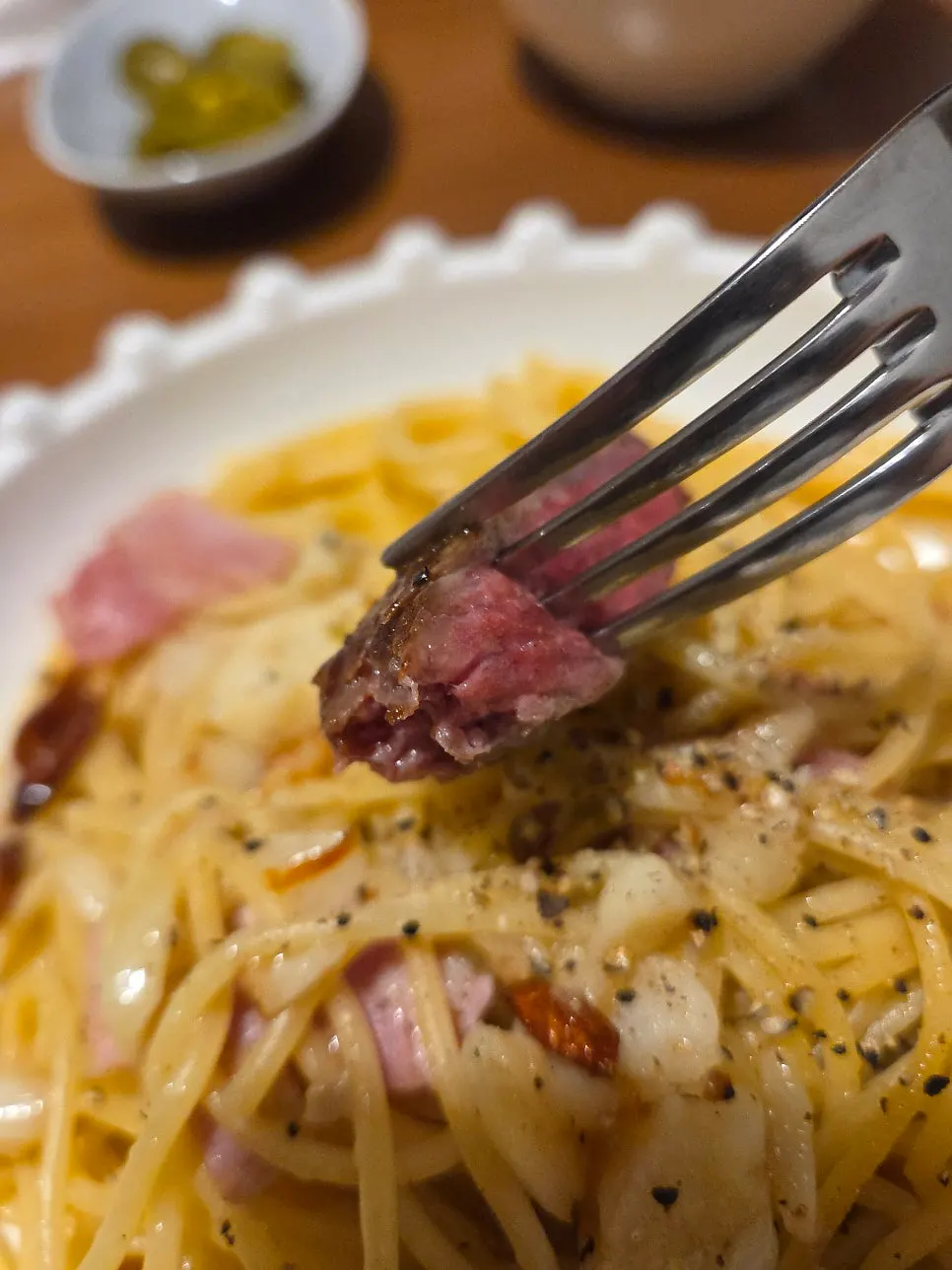 Garlic oil pasta served alongside the steak