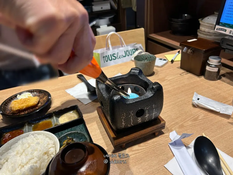 Piece of gyukatsu with breading clinging tightly to the meat