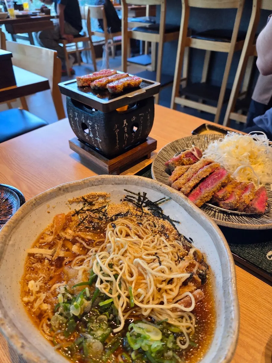 Cold ramen topped with crispy garnish