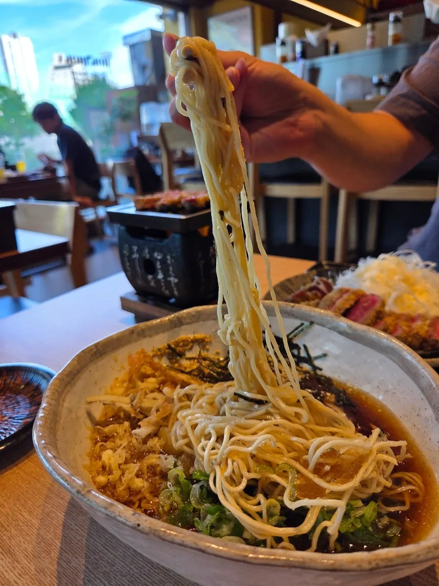 Gyukatsu and cold ramen served together on the table