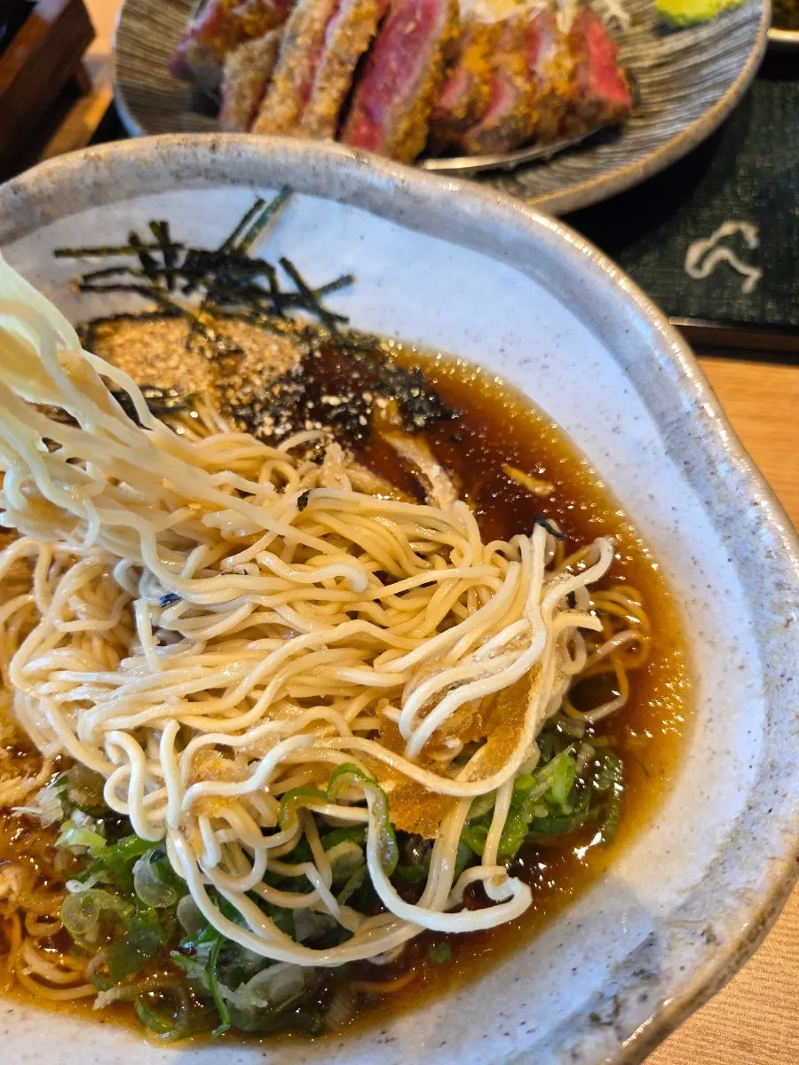 Table set with the gyukatsu and cold ramen combo