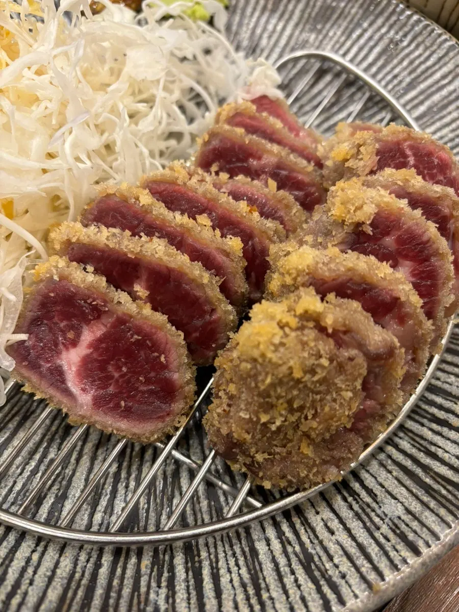 A plate of gyukatsu 130g with vivid red marbling