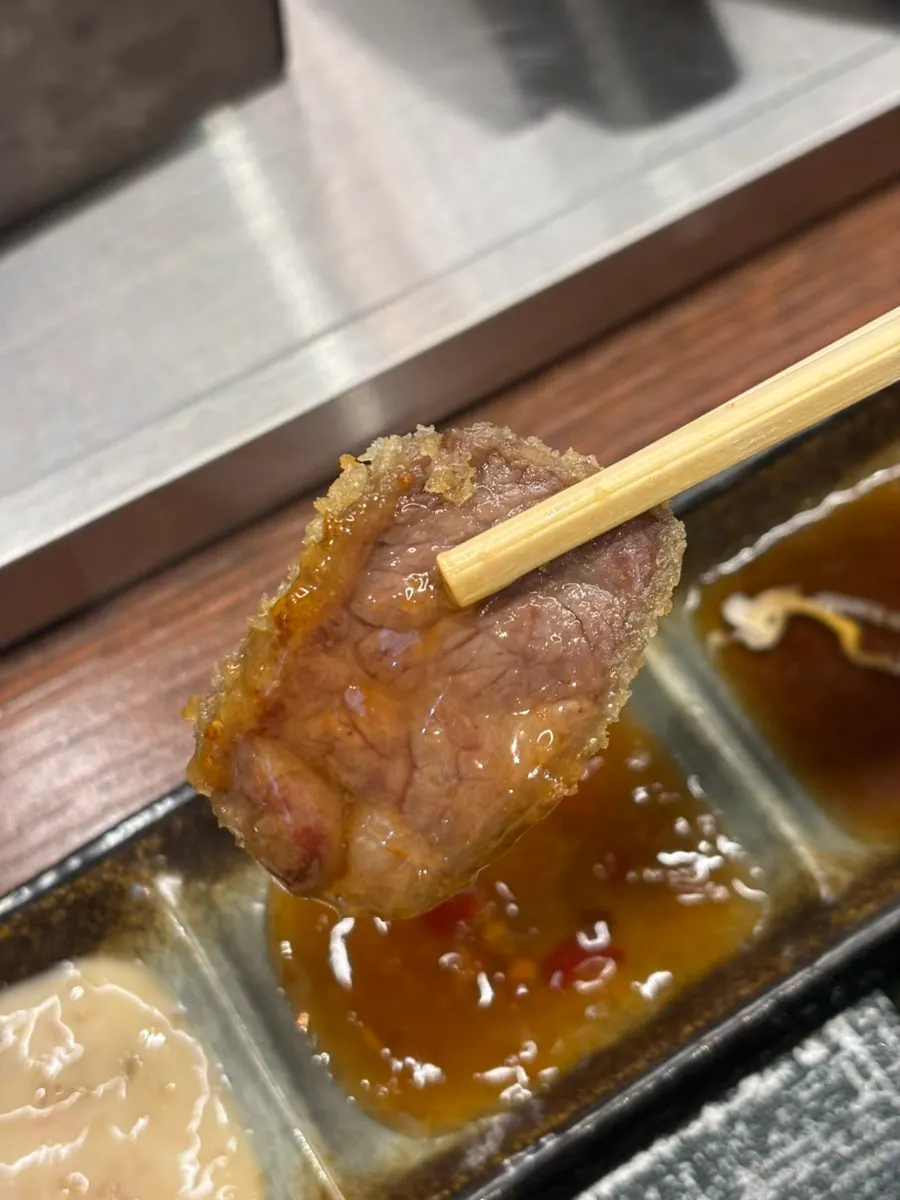 Enjoying the gyukatsu with a variety of sauces