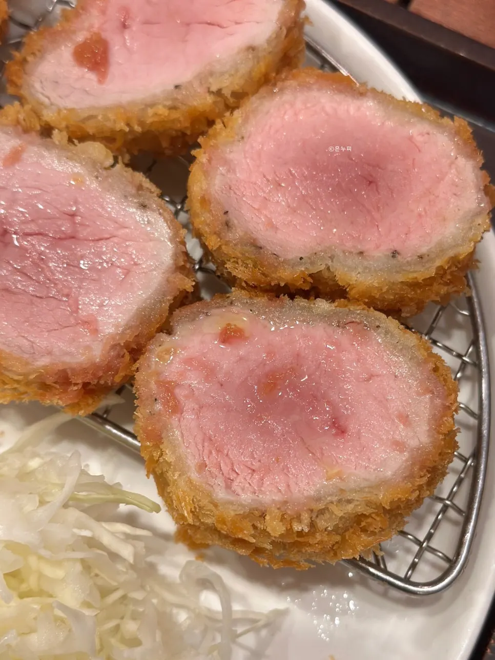Cross-section of a thickly sliced tenderloin cutlet at HOKATSU