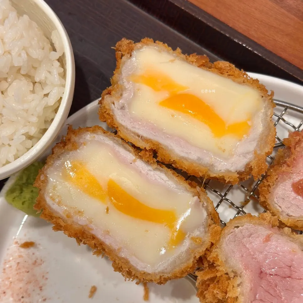 Stretchy melted cheese from HOKATSU's cheese cutlet