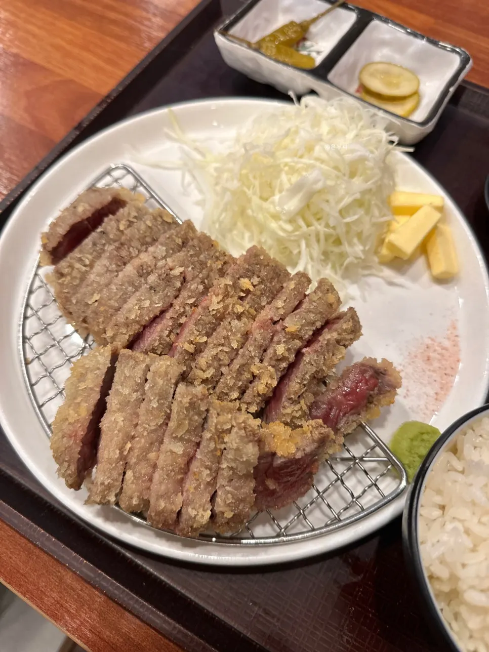 Jumbo grilled gyukatsu served with a tabletop brazier