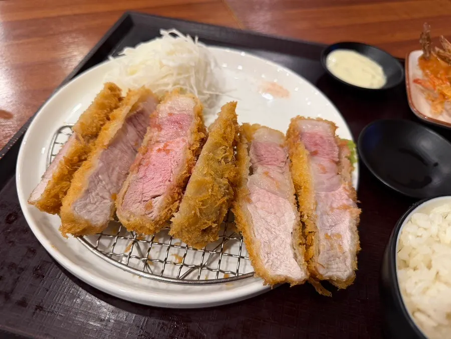 Tonkatsu sauce, salad sauce, and perilla oil on the table