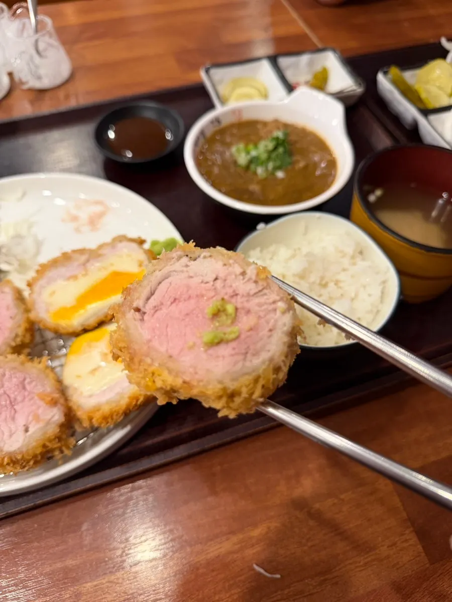 Cross-section of premium loin katsu drizzled with perilla oil