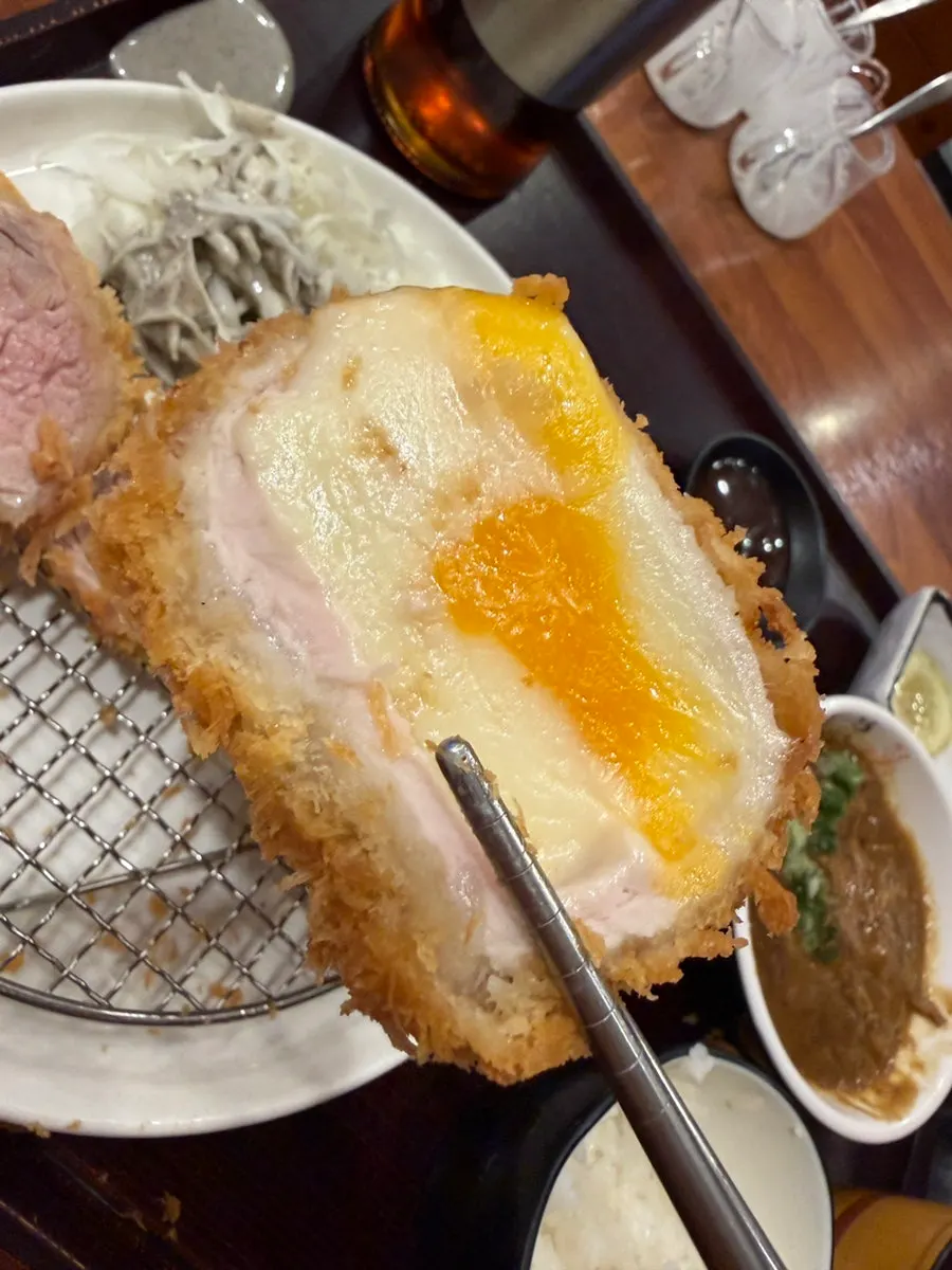 Tonkatsu dipped into mini curry