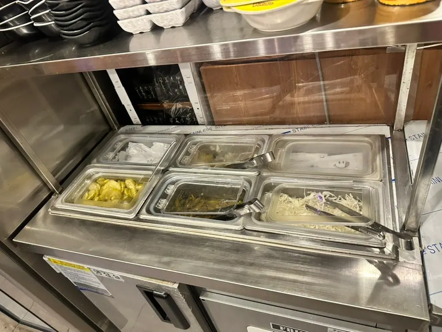 Pickles and baek-kimchi at the self-serve bar