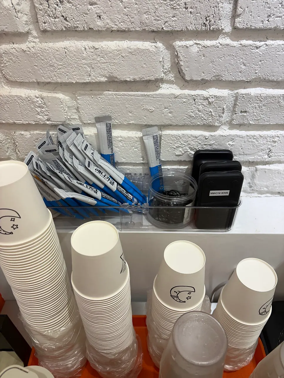 Self-serve bar with water, drinks, and rooibos tea