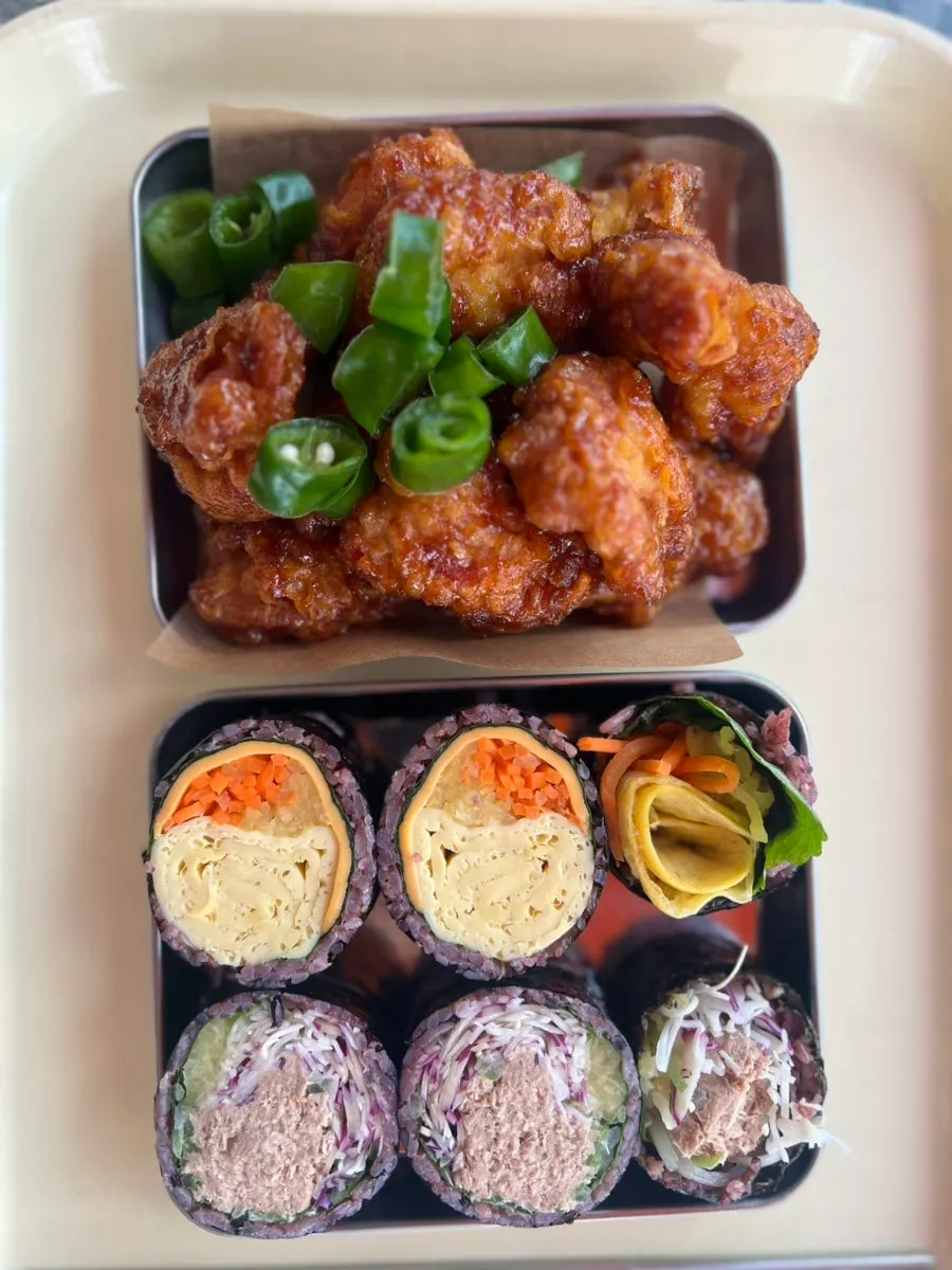 Cross-section of neatly rolled gimbap with a thin layer of rice
