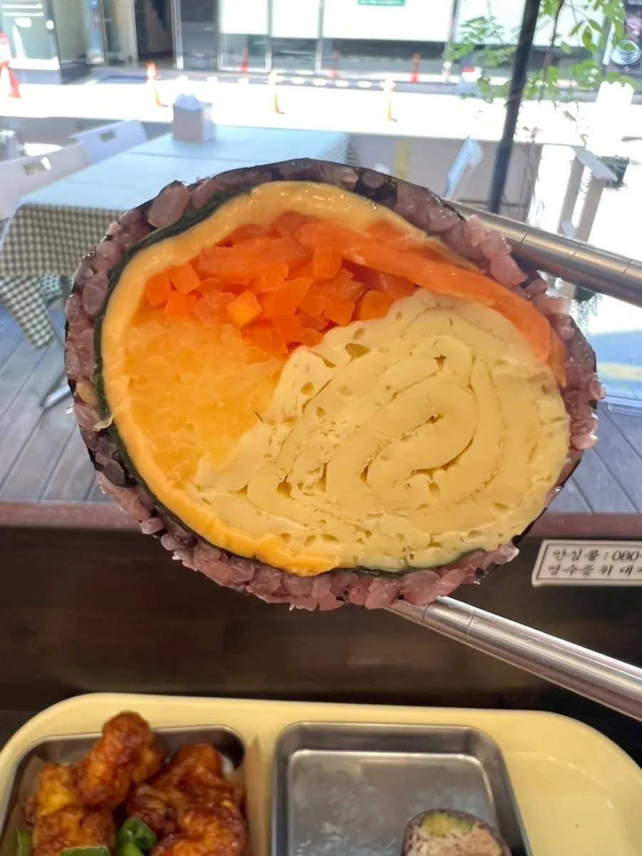 Double cheese egg gimbap packed with egg and cheese