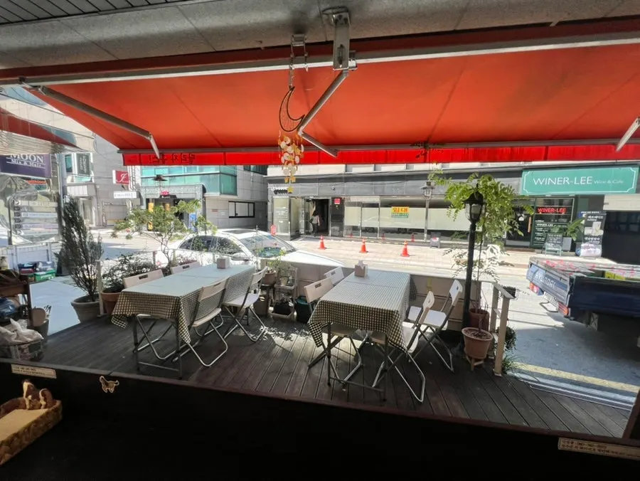 Meal viewed from a seat looking out through the open windows