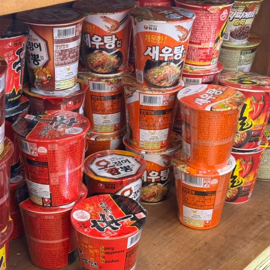 A row of instant noodle options in one section of the store