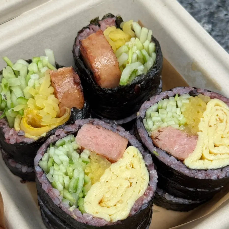 Spam gimbap packed in a takeout container